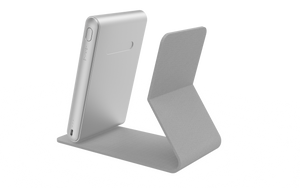 User demonstrating BioLight Shine device for light therapy treatment, emphasizing its ergonomic handheld design.