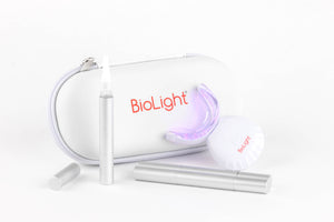 Guardian+ Oral Device by BioLight with blue light settings visible, designed for professional teeth whitening at home.