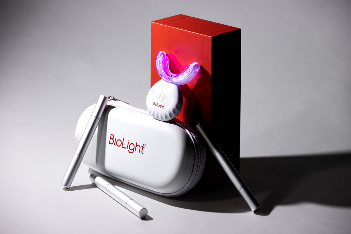 Close-up of the Guardian+ Oral Device by BioLight featuring LED lights, designed for both teeth whitening and red light therapy.
